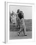 Babe Didrikson, Watching Golf Ball as She Completes Her Swing-null-Framed Photo