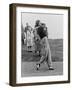 Babe Didrikson, Watching Golf Ball as She Completes Her Swing-null-Framed Photo