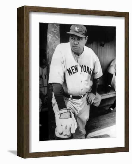 Babe Ruth in the New York Yankees Dugout at League Park in Clevelenad, Ohio, 1934-null-Framed Art Print