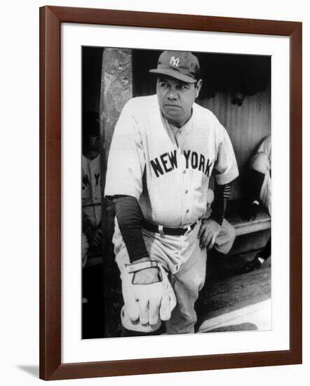 Babe Ruth in the New York Yankees Dugout at League Park in Clevelenad, Ohio, 1934-null-Framed Art Print