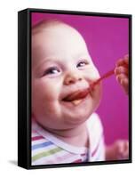 Baby Being Fed Baby Food-Alexandra Grablewski-Framed Stretched Canvas