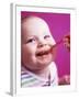 Baby Being Fed Baby Food-Alexandra Grablewski-Framed Photographic Print