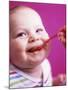 Baby Being Fed Baby Food-Alexandra Grablewski-Mounted Photographic Print