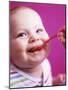 Baby Being Fed Baby Food-Alexandra Grablewski-Mounted Photographic Print