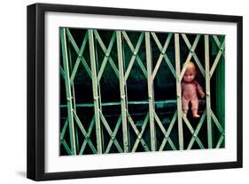 Baby Doll Through Security Fence NYC-null-Framed Photo