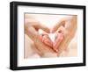 Baby Feet in Mother Hands. Tiny Newborn Baby's Feet on Female Heart Shaped Hands Closeup. Mom and H-Subbotina Anna-Framed Photographic Print