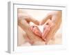 Baby Feet in Mother Hands. Tiny Newborn Baby's Feet on Female Heart Shaped Hands Closeup. Mom and H-Subbotina Anna-Framed Photographic Print