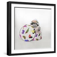 Baby in Hat Box Wearing the Hat from the Box-Nora Hernandez-Framed Giclee Print