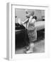 Baby Playing with a Telephone-Yale Joel-Framed Photographic Print