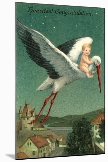 Baby Riding Stork over European Town-null-Mounted Art Print