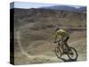 Back View of Competitior Riding Downhill in Mount Sodom International Mountain Bike Race, Israel-Eitan Simanor-Stretched Canvas