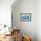 Back View of Father and Kids Sitting on Wooden Dock Looking to Ocean-BlueOrange Studio-Framed Photographic Print displayed on a wall