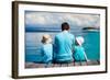 Back View of Father and Kids Sitting on Wooden Dock Looking to Ocean-BlueOrange Studio-Framed Photographic Print