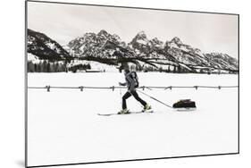 Backcountry skier under the Tetons, Grand Teton National Park, Wyoming, USA-Russ Bishop-Mounted Photographic Print