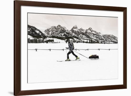 Backcountry skier under the Tetons, Grand Teton National Park, Wyoming, USA-Russ Bishop-Framed Photographic Print