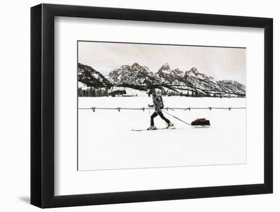 Backcountry skier under the Tetons, Grand Teton National Park, Wyoming, USA-Russ Bishop-Framed Photographic Print