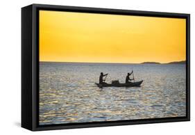 Backlight of Fishermen in a Little Fishing Boat at Sunset-Michael Runkel-Framed Stretched Canvas