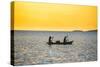 Backlight of Fishermen in a Little Fishing Boat at Sunset-Michael Runkel-Stretched Canvas