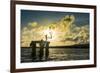 Backlit local boys jumping into the water of the lagoon of Wallis from a platform, Wallis and Futun-Michael Runkel-Framed Photographic Print