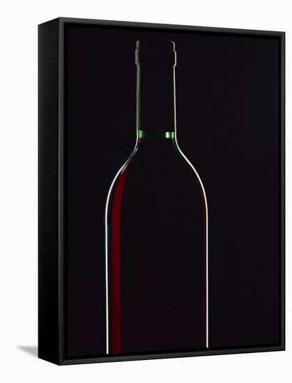 Backlit Shot of a Bottle of Red Wine-Lee Frost-Framed Stretched Canvas