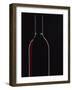 Backlit Shot of a Bottle of Red Wine-Lee Frost-Framed Photographic Print