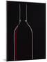 Backlit Shot of a Bottle of Red Wine-Lee Frost-Mounted Photographic Print