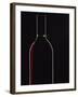 Backlit Shot of a Bottle of Red Wine-Lee Frost-Framed Photographic Print