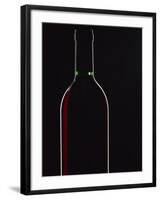 Backlit Shot of a Bottle of Red Wine-Lee Frost-Framed Photographic Print