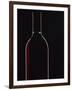 Backlit Shot of a Bottle of Red Wine-Lee Frost-Framed Photographic Print