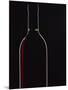 Backlit Shot of a Bottle of Red Wine-Lee Frost-Mounted Photographic Print