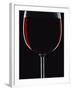 Backlit Shot of a Glass of Red Wine-Lee Frost-Framed Photographic Print