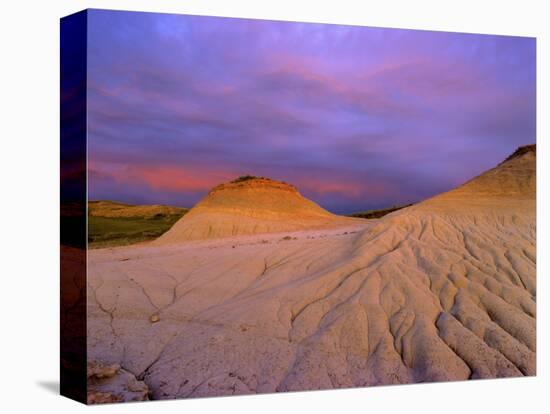 Badlands at Twilight in the Little Missouri National Grasslands, North Dakota, USA-Chuck Haney-Stretched Canvas