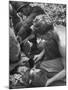 Badly Wounded Medic Being Given Water While Soldier in Background Cuts Clothing from His Wounds-null-Mounted Photographic Print