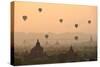 Bagan, balloons flying over ancient temples-Sarawut Intarob-Stretched Canvas