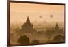 Bagan, Mandalay region, Myanmar (Burma). Pagodas and temples with balloons at sunrise.-Marco Bottigelli-Framed Photographic Print