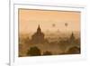 Bagan, Mandalay region, Myanmar (Burma). Pagodas and temples with balloons at sunrise.-Marco Bottigelli-Framed Photographic Print