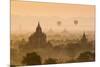 Bagan, Mandalay region, Myanmar (Burma). Pagodas and temples with balloons at sunrise.-Marco Bottigelli-Mounted Photographic Print