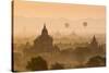 Bagan, Mandalay region, Myanmar (Burma). Pagodas and temples with balloons at sunrise.-Marco Bottigelli-Stretched Canvas