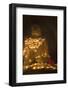 Bagan, Mandalay region, Myanmar (Burma). Young monk praying at a giant brick-make statue of the Bud-Marco Bottigelli-Framed Photographic Print