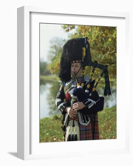 Bagpiper, Scotland, United Kingdom, Europe-Nigel Francis-Framed Photographic Print