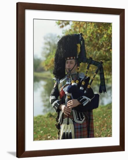 Bagpiper, Scotland, United Kingdom, Europe-Nigel Francis-Framed Photographic Print