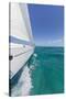 Bahamas, Exuma Island. Sailboat under Sail in Ocean-Don Paulson-Stretched Canvas