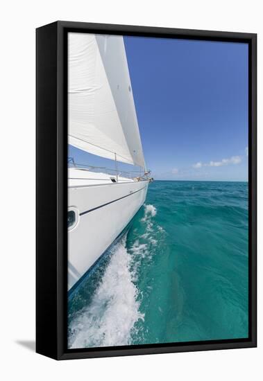 Bahamas, Exuma Island. Sailboat under Sail in Ocean-Don Paulson-Framed Stretched Canvas