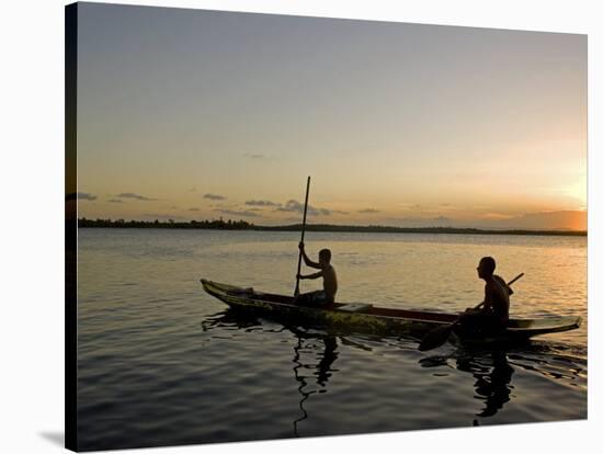 Bahia, Barra De Serinhaem, Fishermen Returning to Shore at Sunset in Thier Dug Out Canoe, Brazil-Mark Hannaford-Stretched Canvas