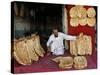 Baker Arranges Breads at His Shop in Kandahar Province, South of Kabul, Afghanistan-null-Stretched Canvas