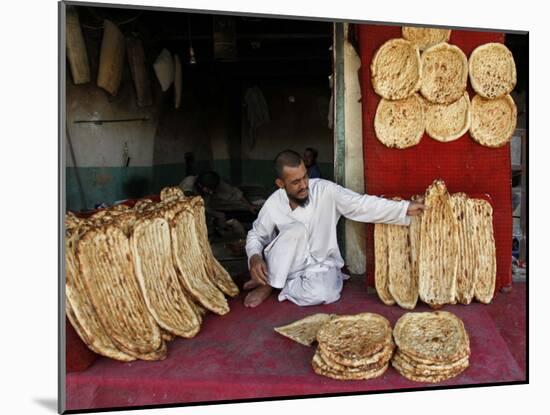 Baker Arranges Breads at His Shop in Kandahar Province, South of Kabul, Afghanistan-null-Mounted Photographic Print