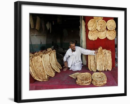 Baker Arranges Breads at His Shop in Kandahar Province, South of Kabul, Afghanistan-null-Framed Photographic Print