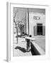 Baker's Apprentice Carrying a Large Tray of Bread Dough-Alfred Eisenstaedt-Framed Photographic Print