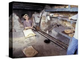 Baking Bread in a Wood-Fired Oven, Morocco-Merrill Images-Stretched Canvas