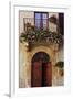 Balcony Flowers and Doorway in Pienza Tuscany Italy-Julian Castle-Framed Photo